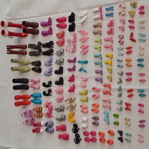 80+ pairs of shoes. Barbie, Bratz,Baby,Polly pocket and others